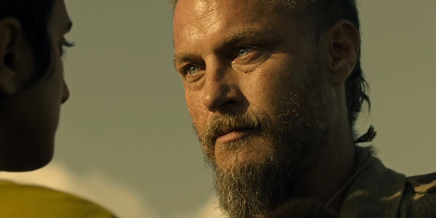 Travis Fimmel as Caleb looking at another character in Raised by Wolves