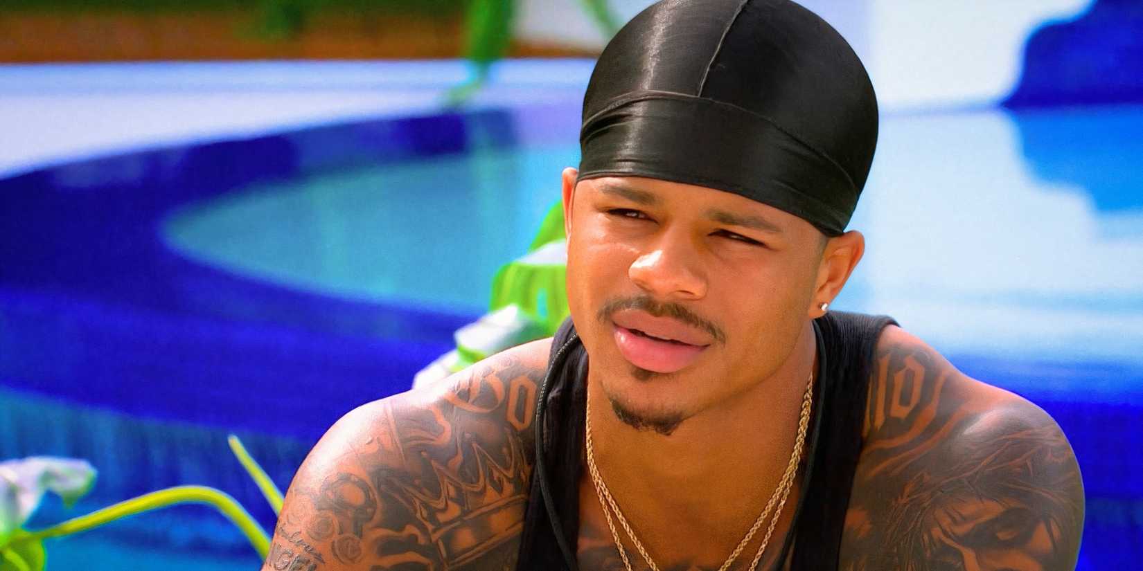 Ace Greene from Love Island USA season 7 squinting in the sun.