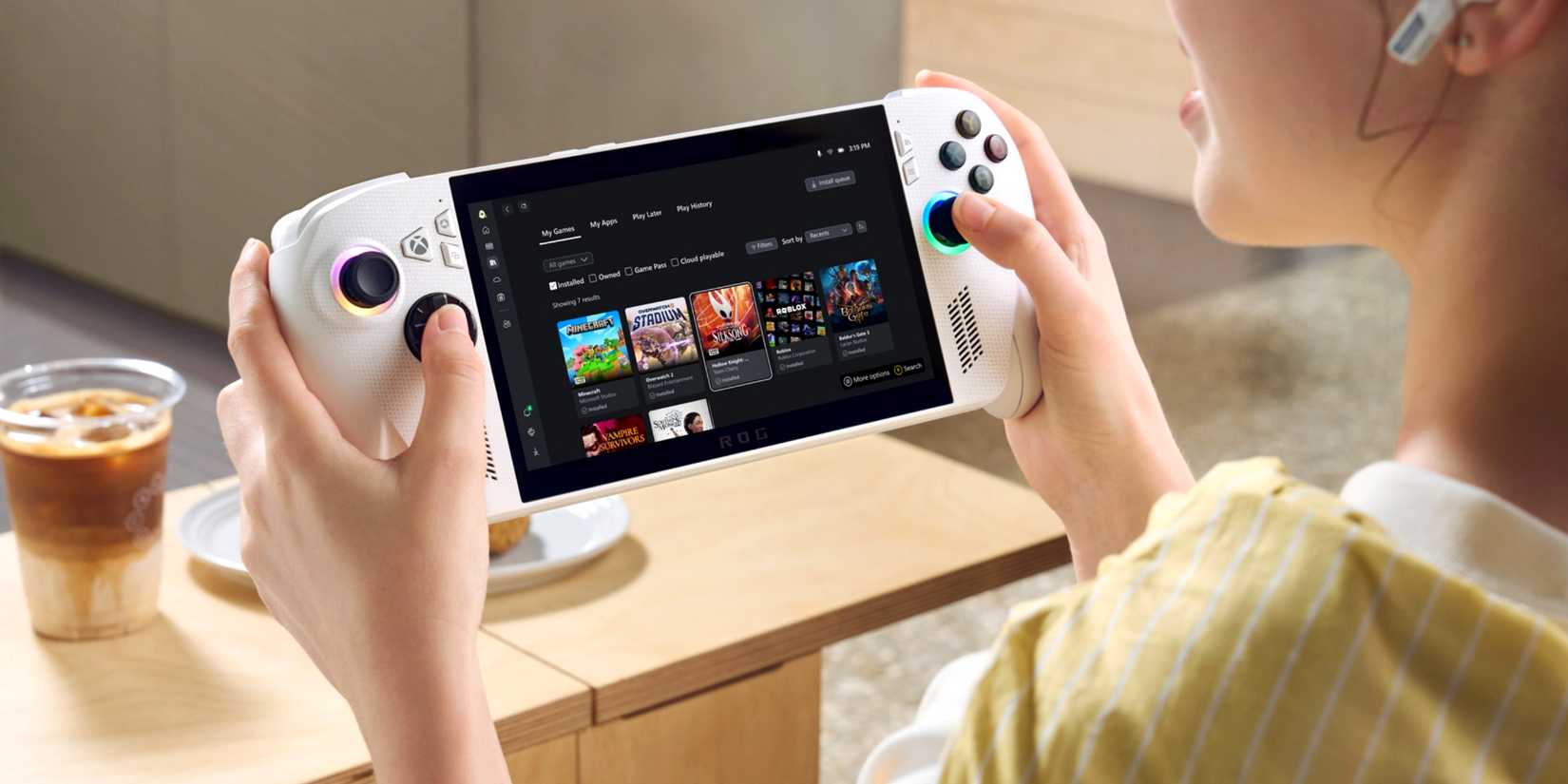 Promo image of a woman holding the ROG Xbox Ally.