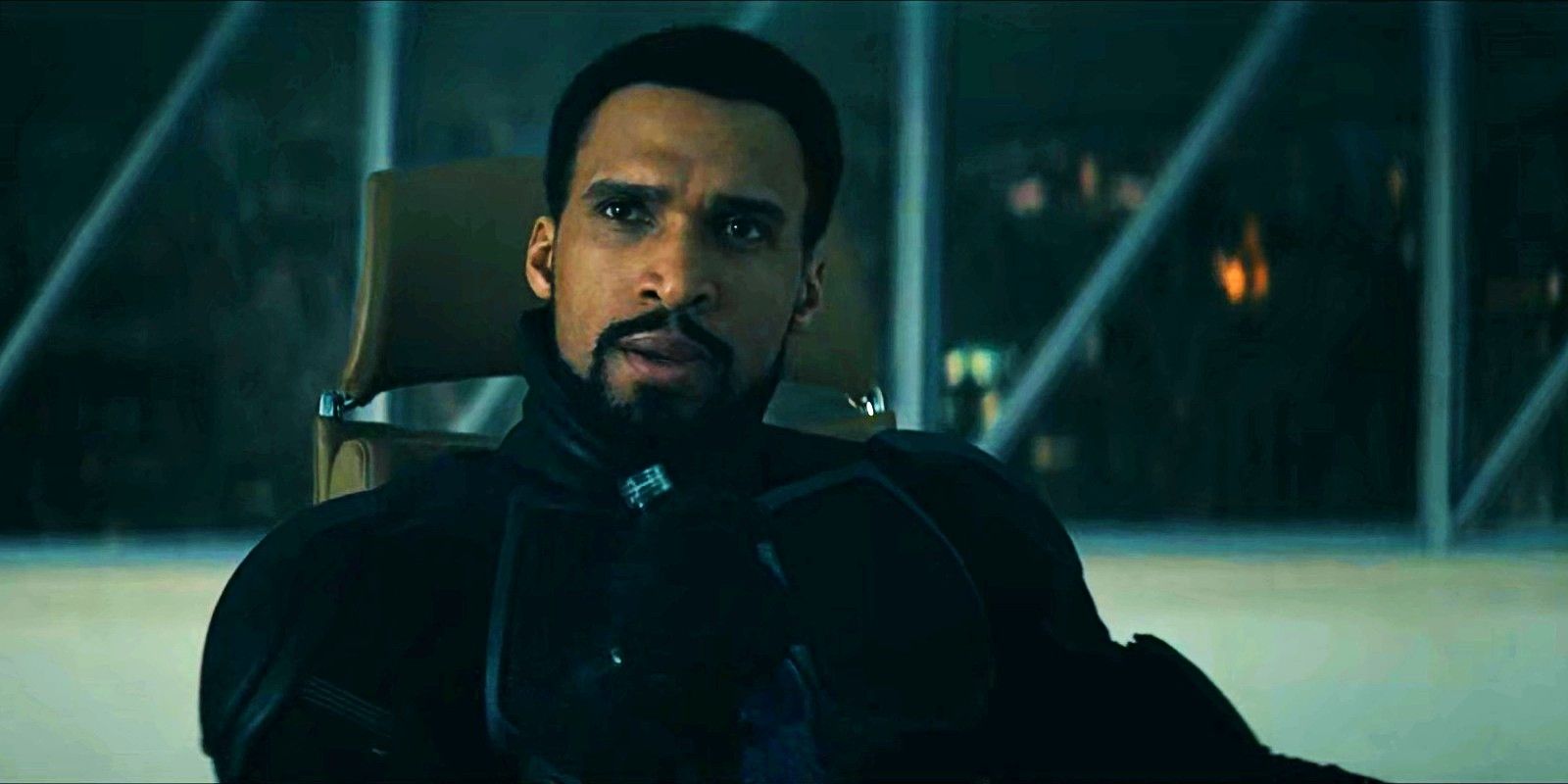 Black Noir II (Nathan Mitchell) sitting in Homelander's chair in The Boys season 4