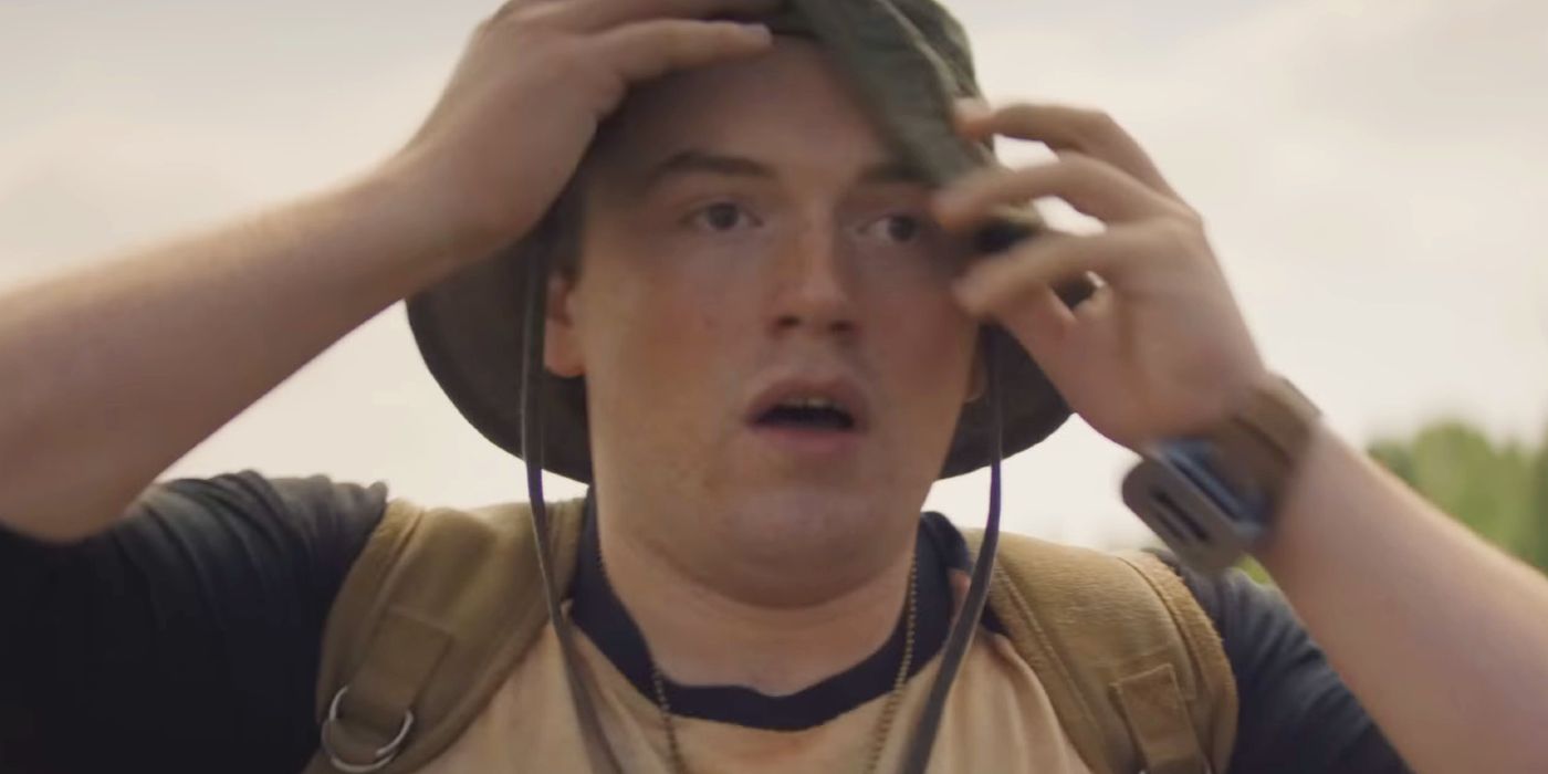 Cooper Hoffman looking shocked with his hands up in The Long Walk