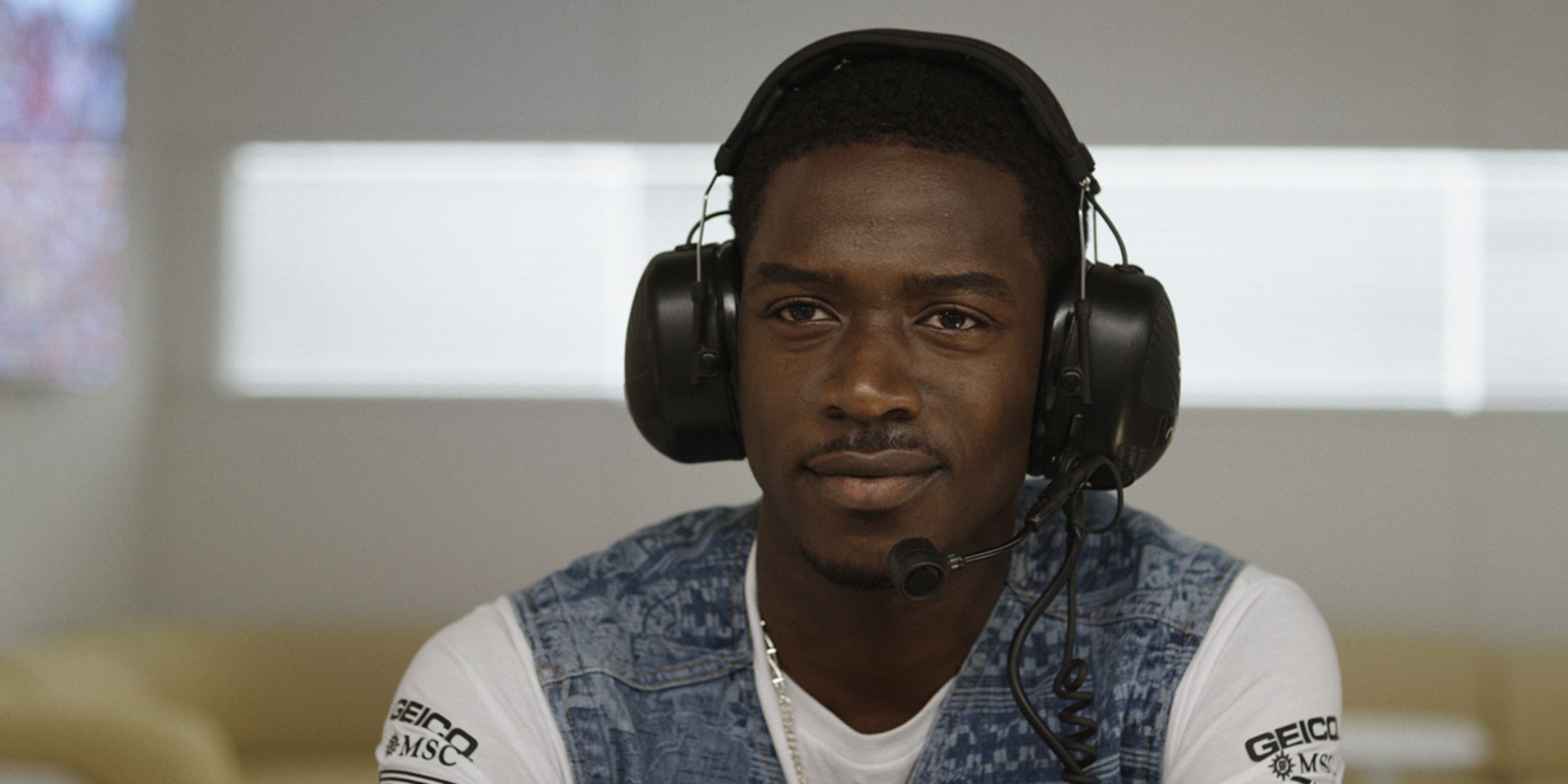 Damson Idris wearing a headset in F1 movie