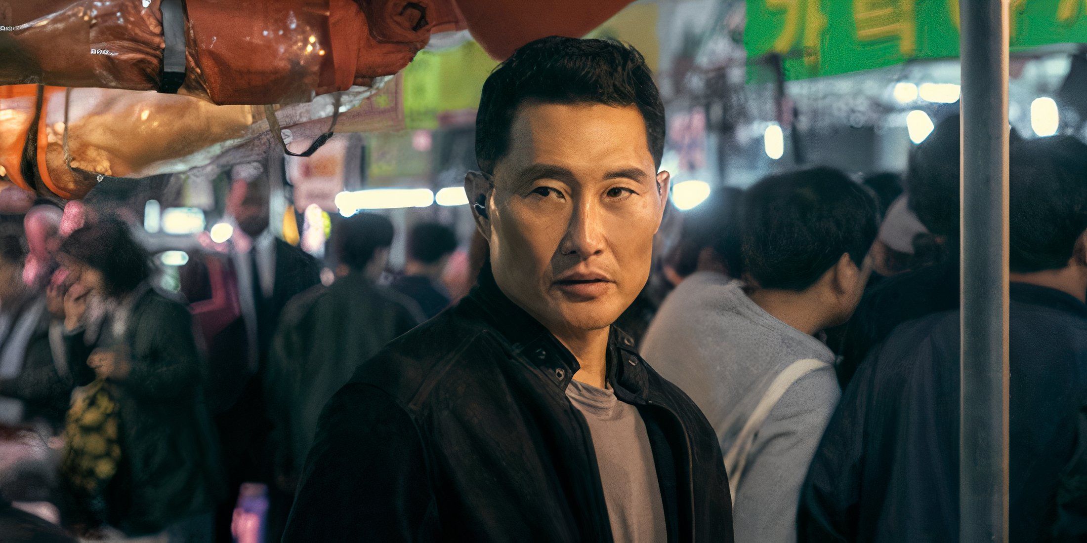 Daniel Dae Kim looking suspiciously over his shoulder in Butterfly