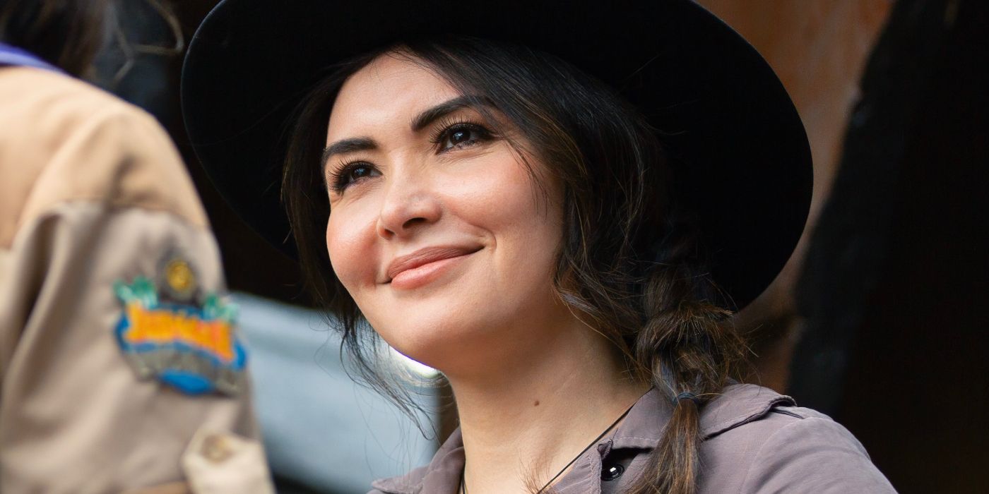 Daniella Pineda as Camila smiling in Dora and the Search for Sol Dorado