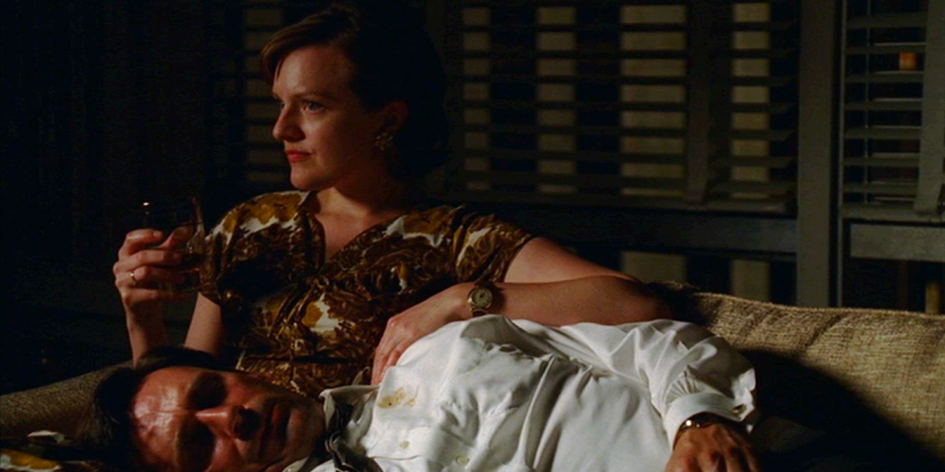 Don lies on Peggy's lap in Mad Men