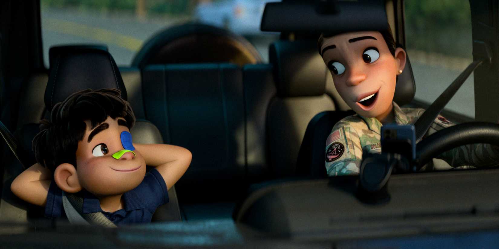 Elio and Olga Solís talking in the car in Elio