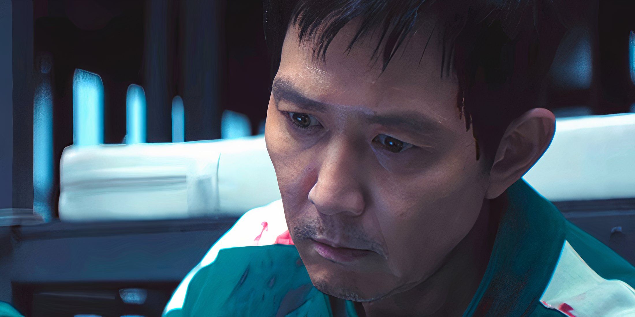 Gi-hun looking down and defeated in Squid Game season 3 episode 1