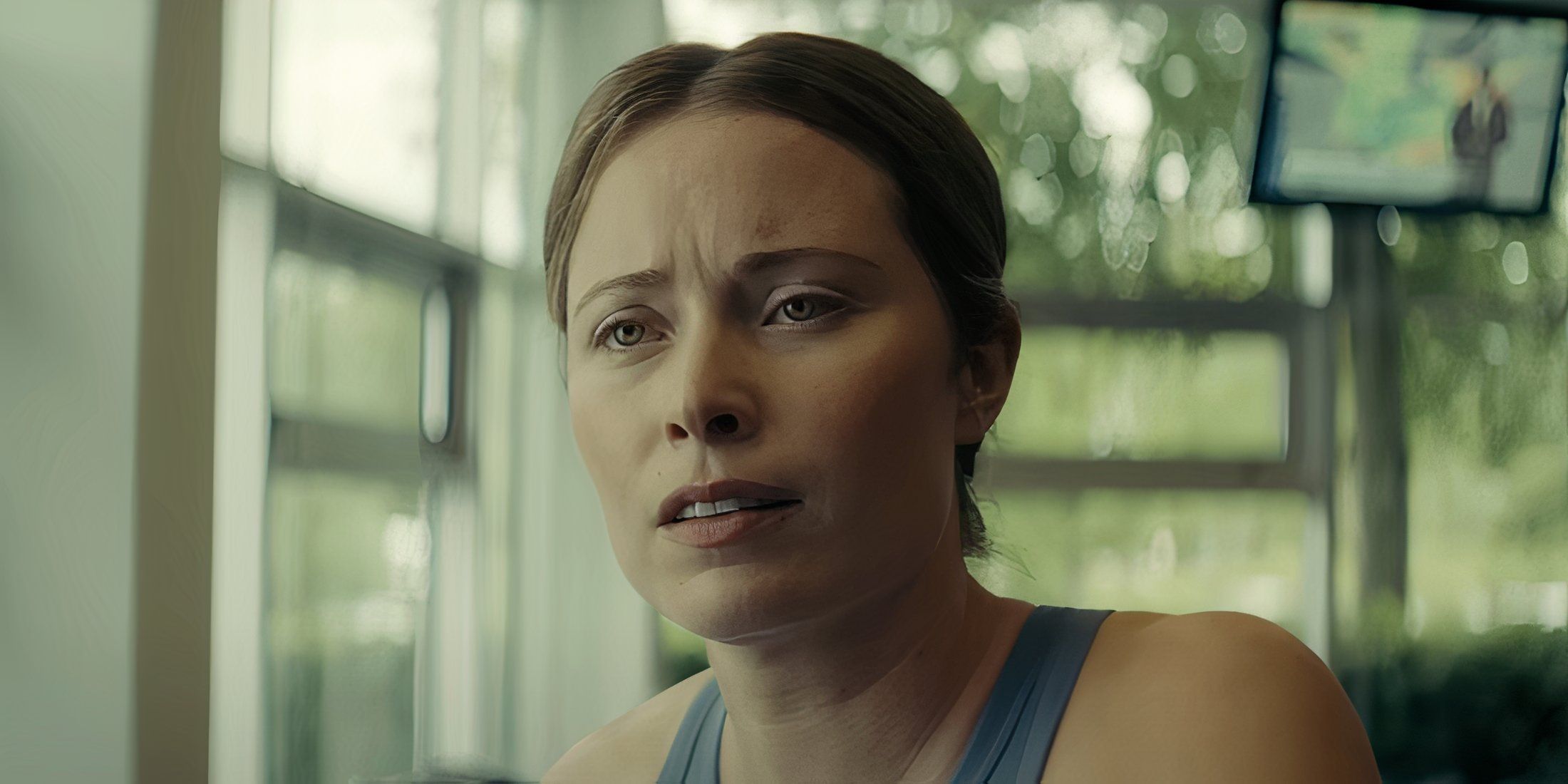 Hannah Emily Anderson as Ashley Gudson looking serious in Smoke
