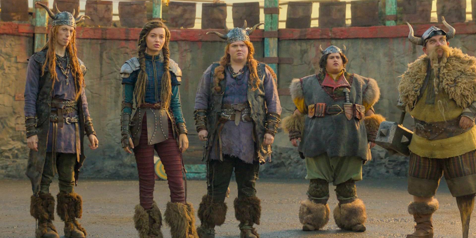 Tuffnut (Harry Trevaldwyn), Astrid (Nico Parker), Ruffnut (Bronwyn James), Fishlegs (Julian Dennison), and Gobber (Nick Frost) very confused in How To Train Your Dragon (2025)