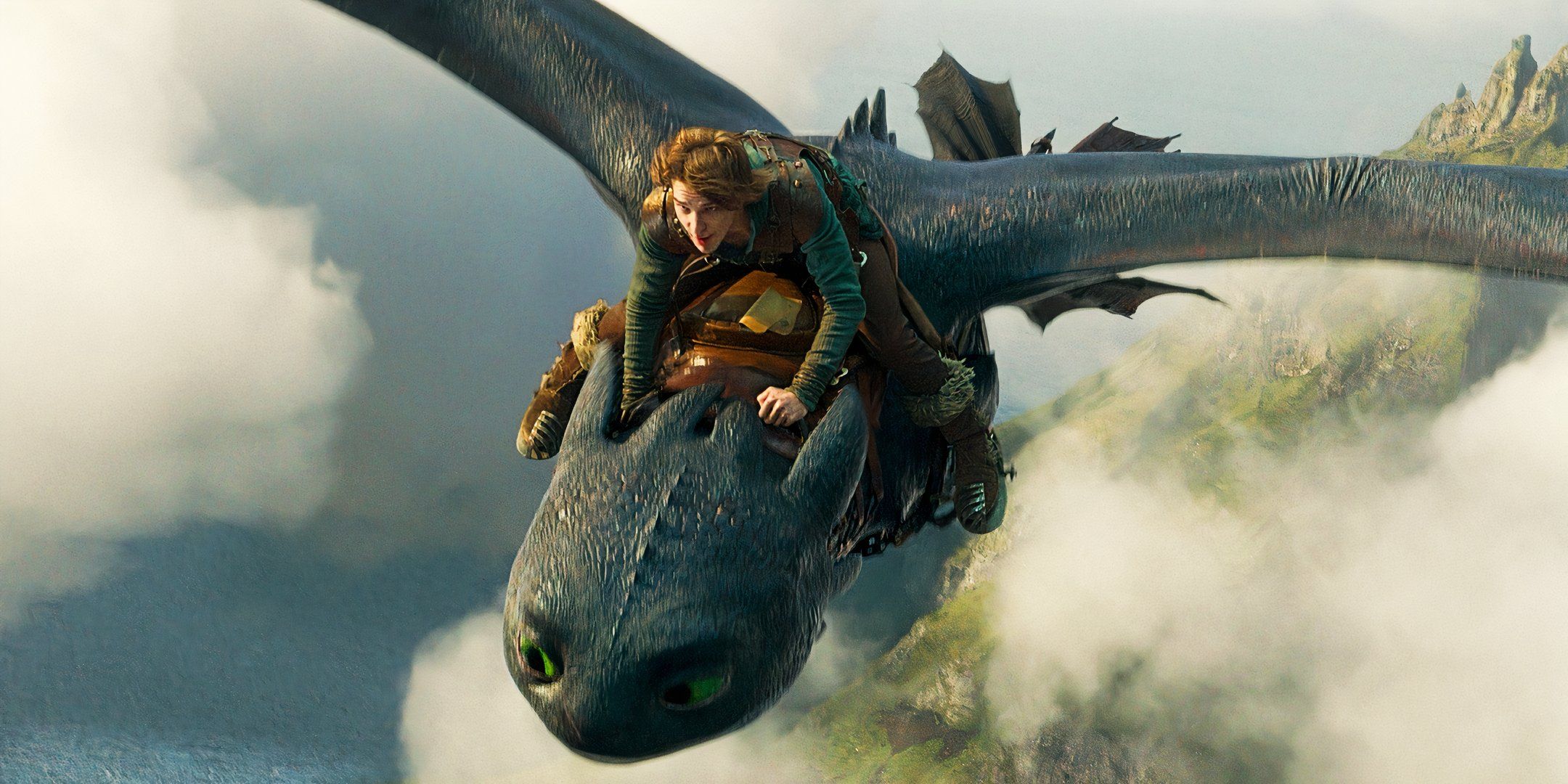 Mason Thames as Hiccup riding Toothless during a test flight in How to Train Your Dragon 2025
