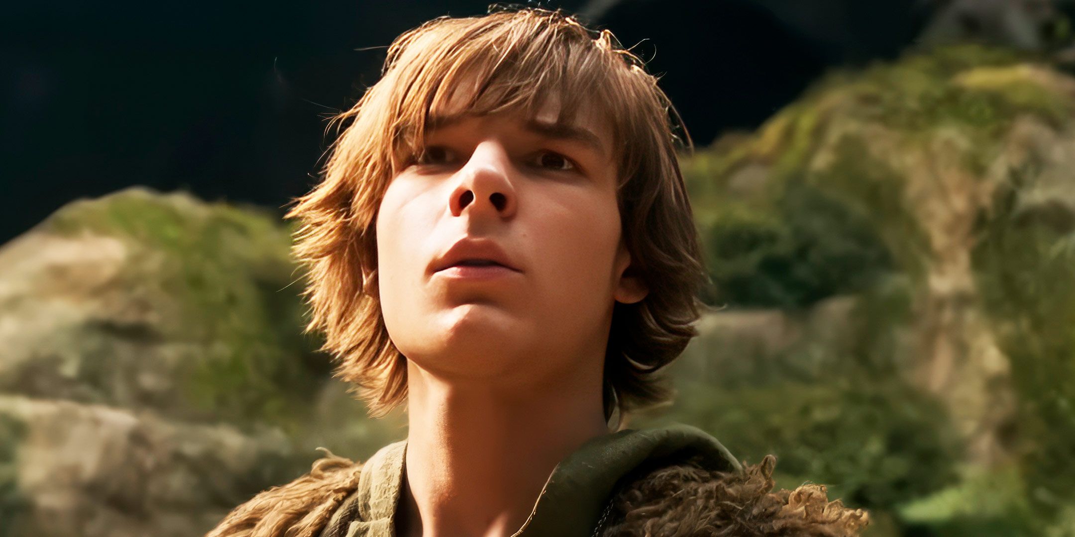 Mason Thames as Hiccup looking upward in How to Train Your Dragon 2025