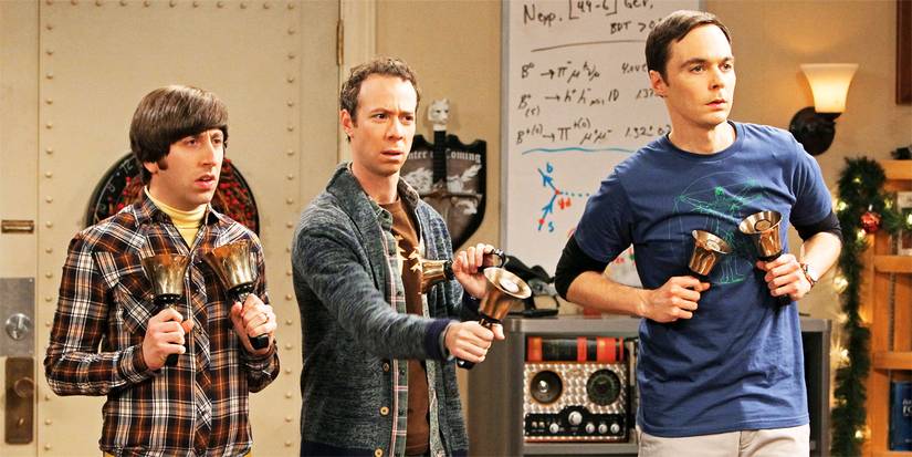 Howard (Simon Helberg), Stuart (Kevin Sussman) and Sheldon (Jim Parsons) holding bells in The Big Bang Theory