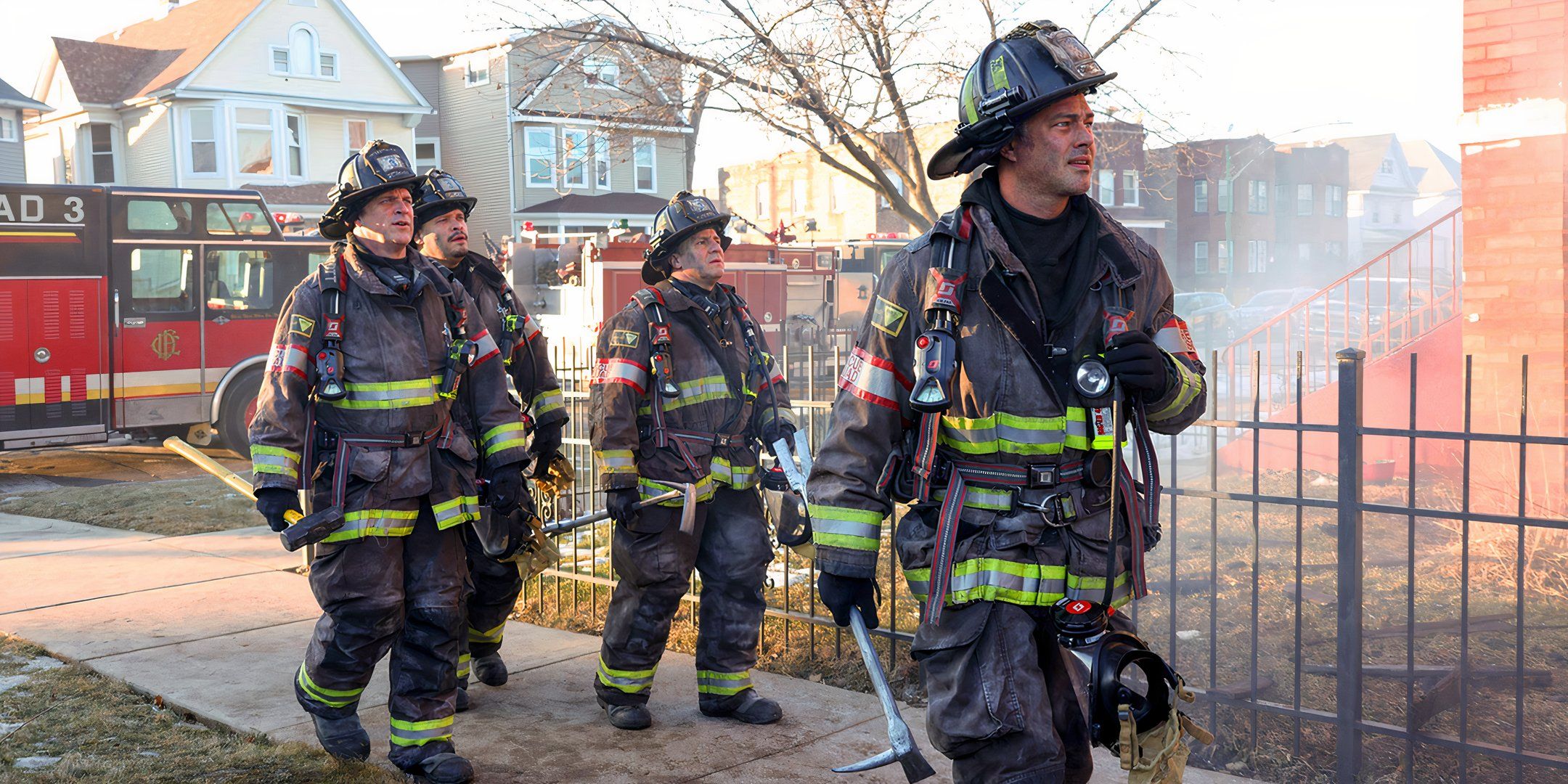 Kelly Severide leading other firefighters in Chicago Fire.