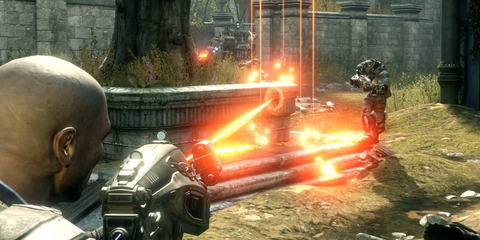 Gears of War: Reloaded player firing at enemies with Hammer of Dawn in online multiplayer