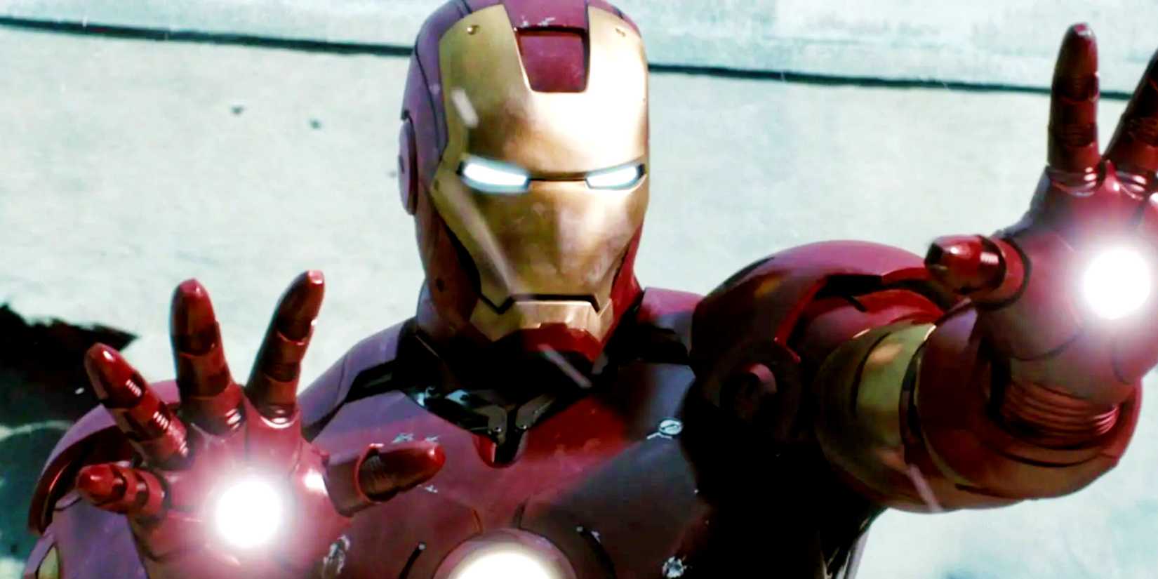 Iron Man holds up his hands in his full suit of MK3 armor in Iron Man