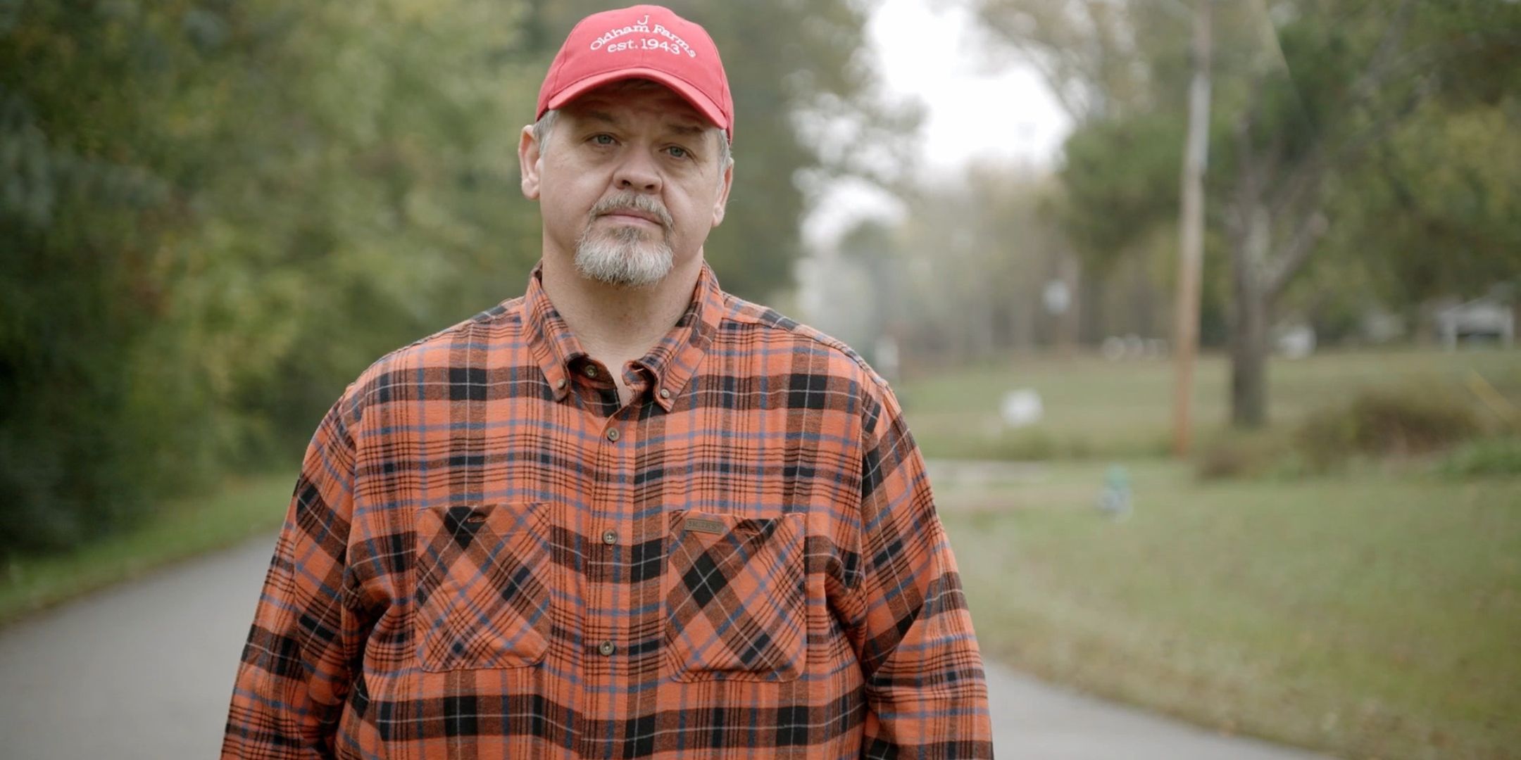 1000-Lb Sisters’ Chris Combs with a neutral expression while standing outside