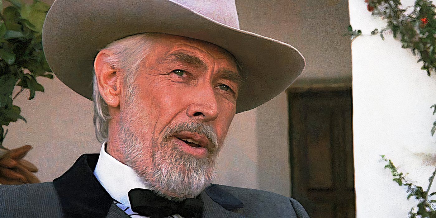 James Coburn converses in a scene from Young Guns 2