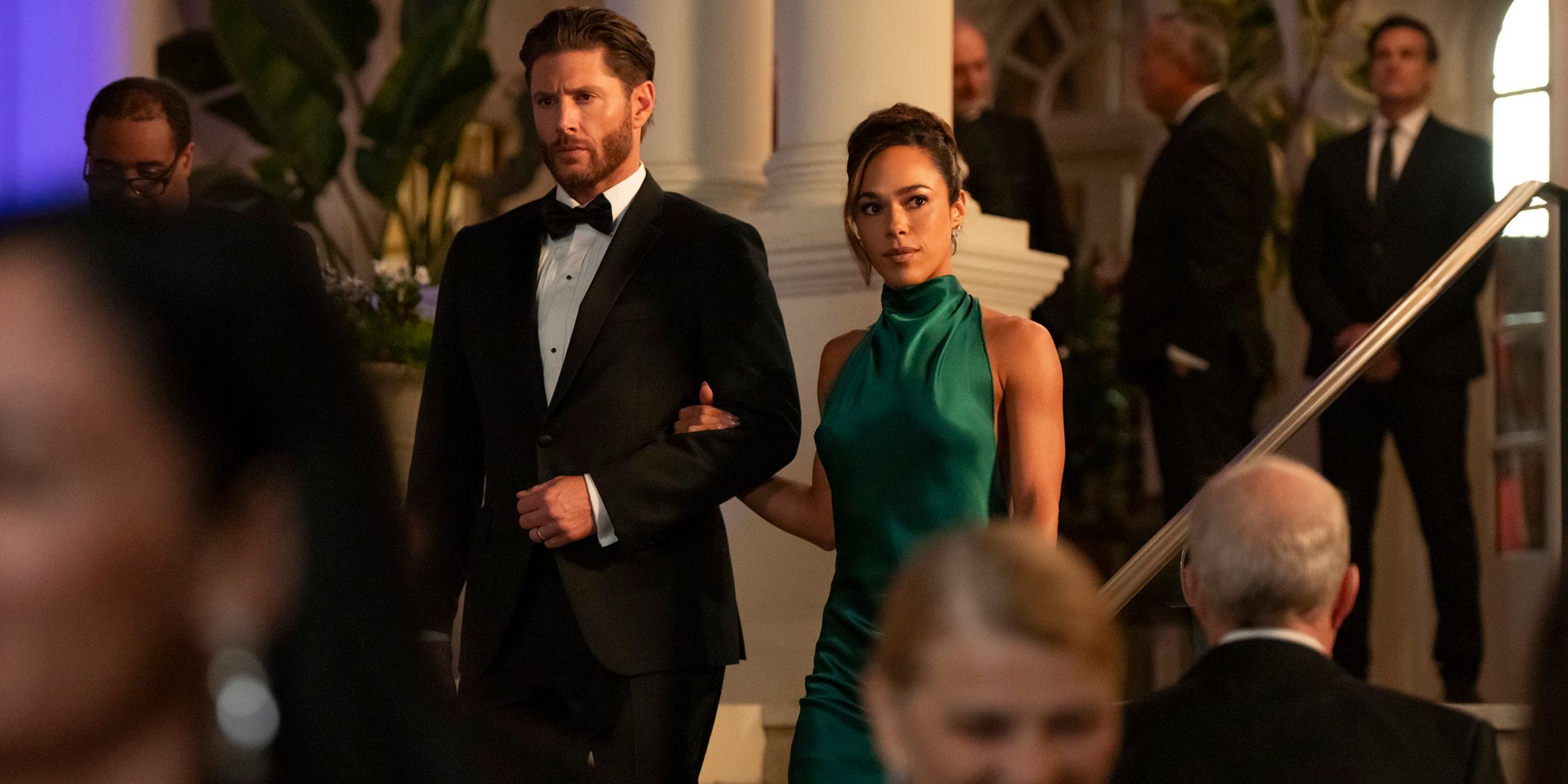 Jensen Ackles' Meachum and Jessica Camacho's Oliveras entering a party in Countdown season 1