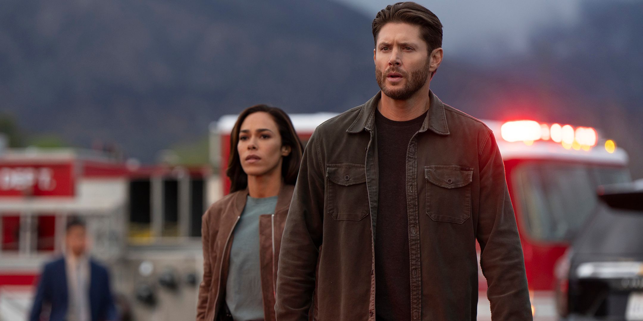 Jensen Ackles' Meachum and Jessica Camacho's Oliveras walking up to a crime scene looking intense in Countdown season 1