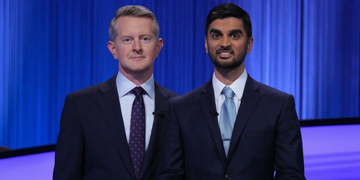 Jeopardy Champion Nikhil Joshi Posing With Host Ken Jennings At The Podium