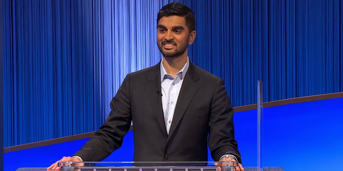 Jeopardy Champion Nikhil Joshi Smiling At The Podium