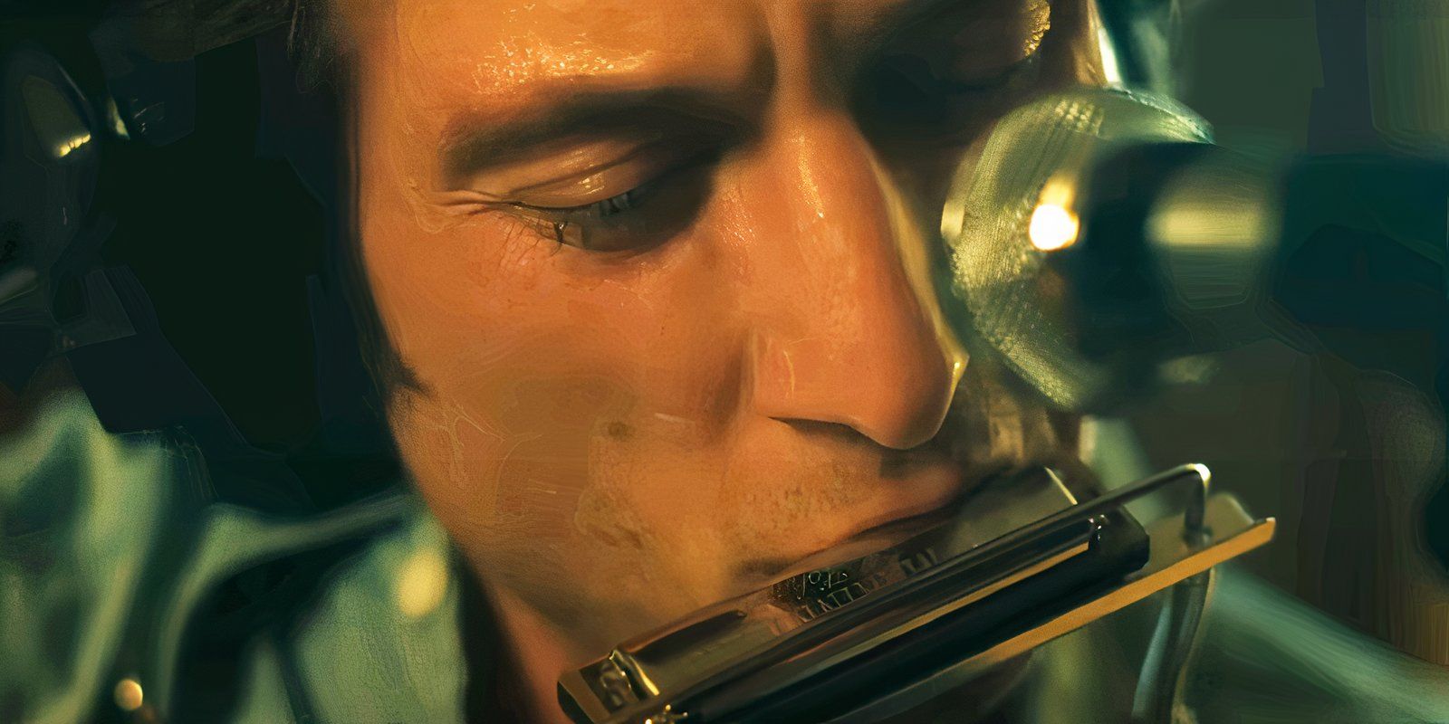 Jeremy Allen White playing the harmonica in Deliver Me from Nowhere