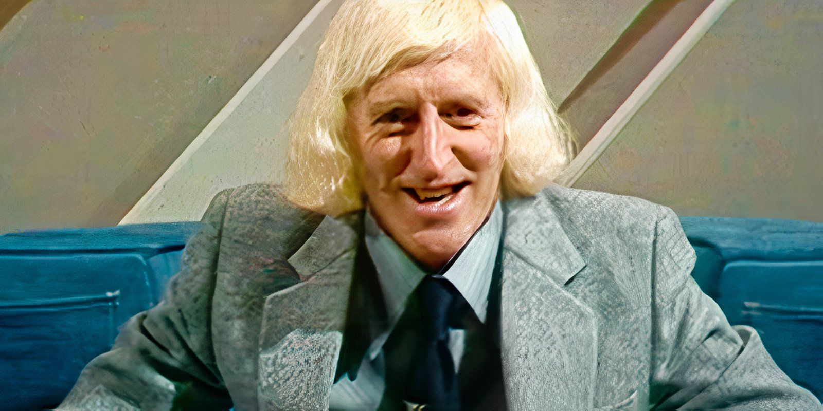 Jimmy Savile smiling in an archive of Jimmy Savile A British Horror Story
