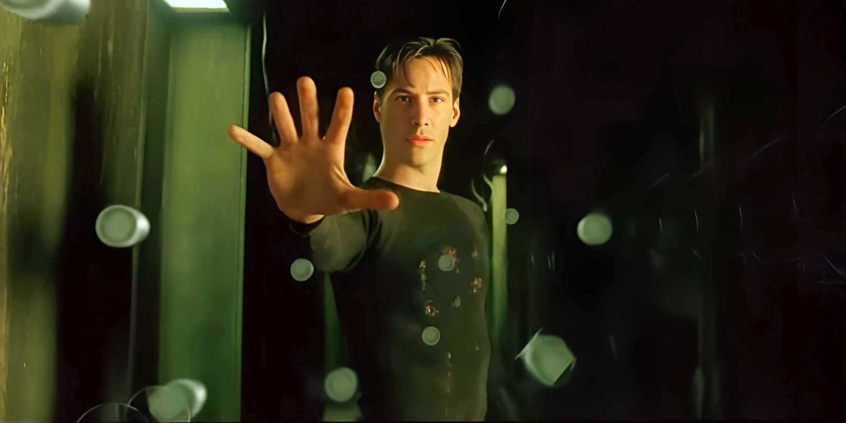 Keanu Reeves as Neo using his powers in The Matrix