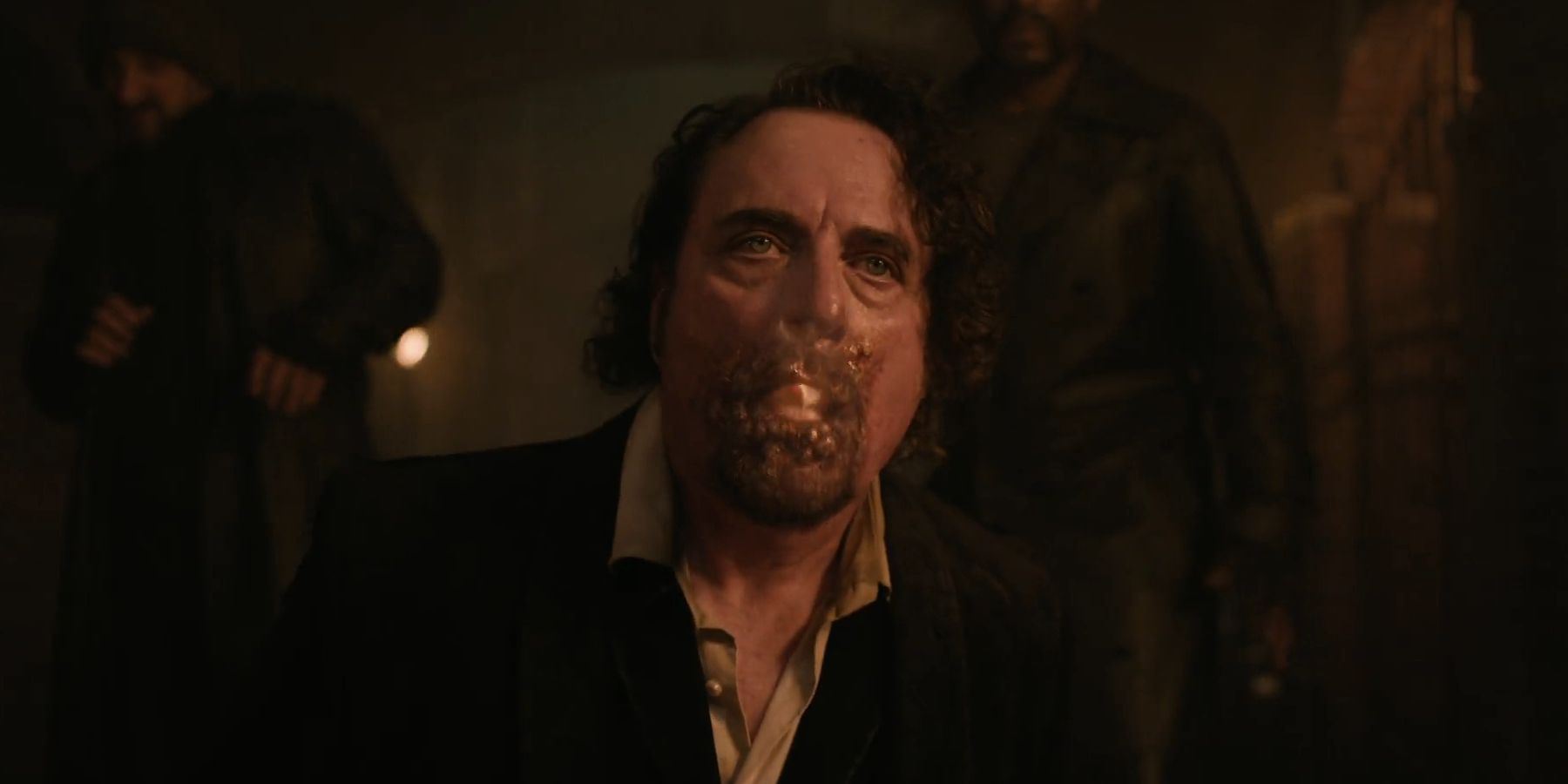 Kim Coates as Bruegel having his mouth burned in The Walking Dead: Dead City season 2