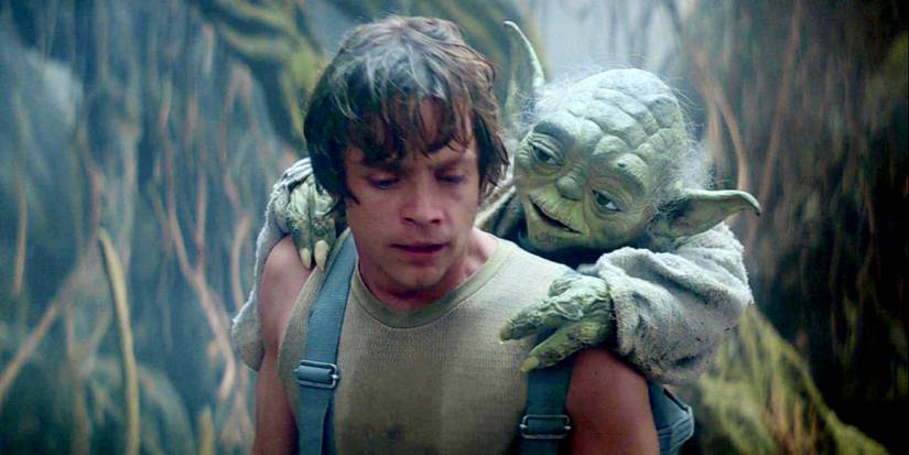 Luke Skywalker carries Yoda on his back on Dagobah in The Empire Strikes Back