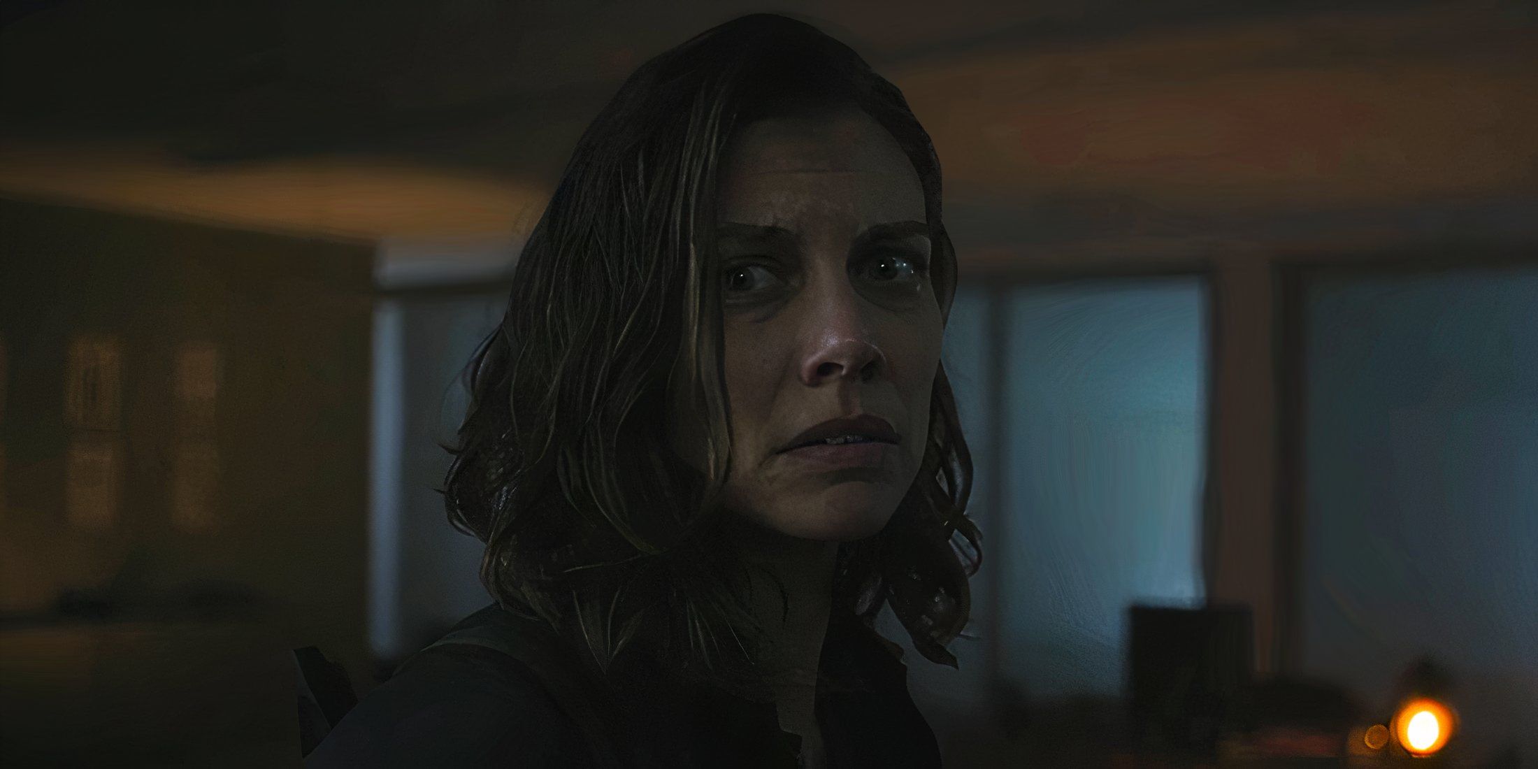 Maggie looking off to the side worried in The Walking Dead Dead City season 2 episode 7