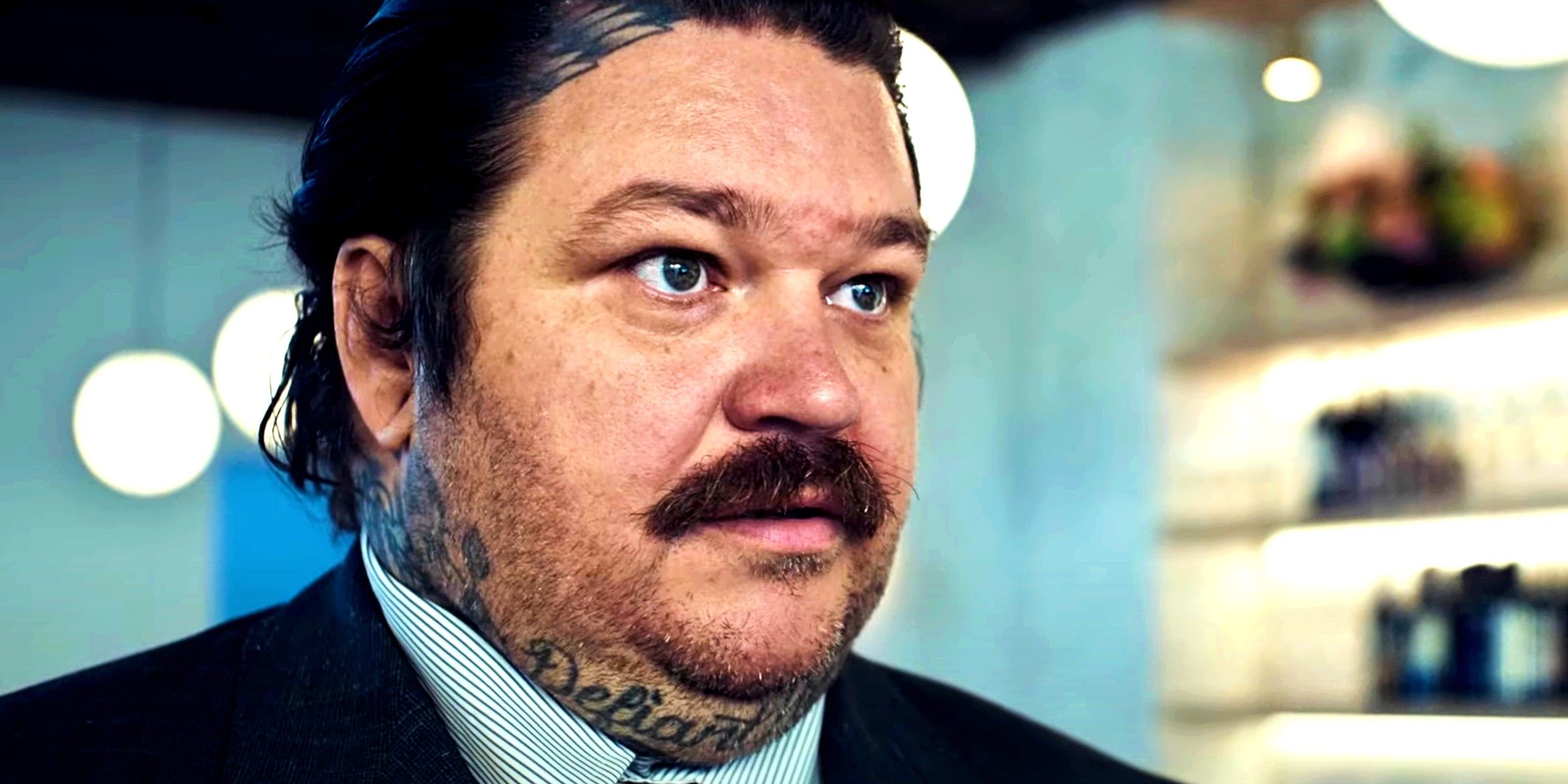 Matty Matheson as Neil Fak looking to the right of the screen in season 3 of the bear 3
