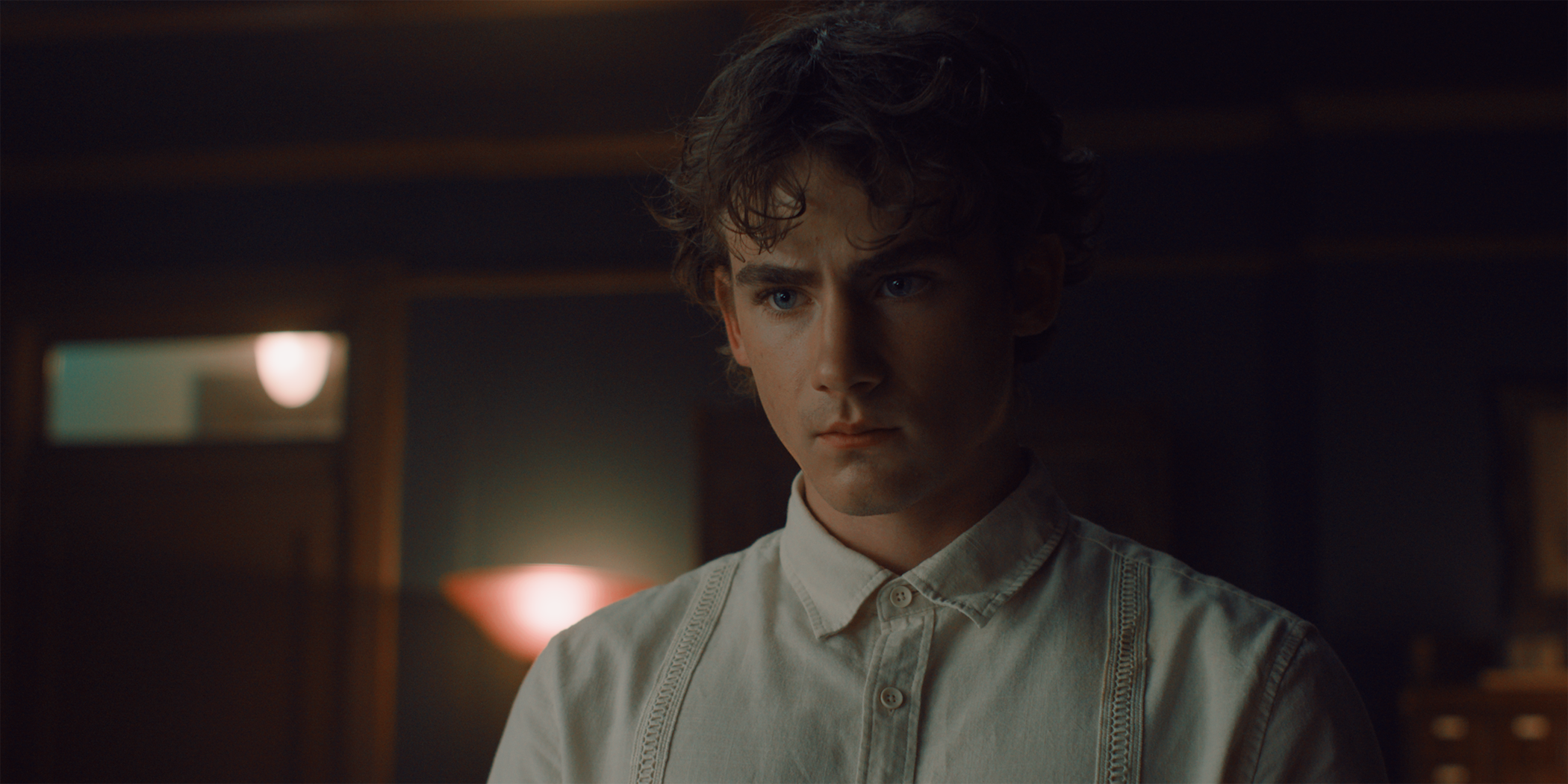 Max looking at his father in Abraham's Boys