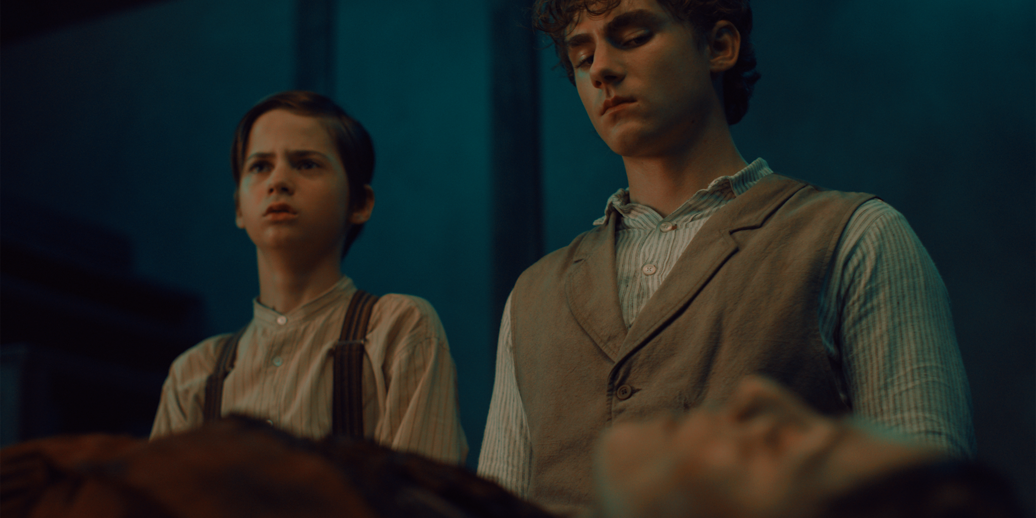 Max & Rudy looking at a woman's body in Abraham's Boys