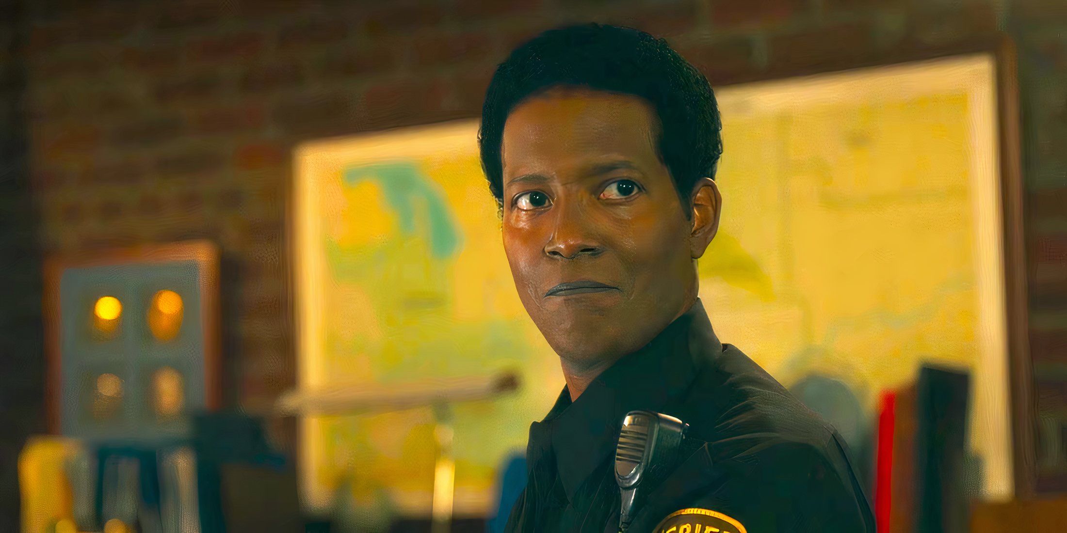 Mike with a small smirk on his face in Resident Alien season 4 episode 1