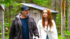 Morgan Kohan's Maggie and Scott Patterson's Sully argue while walking in the woods from Sullivan's Crossing season 1