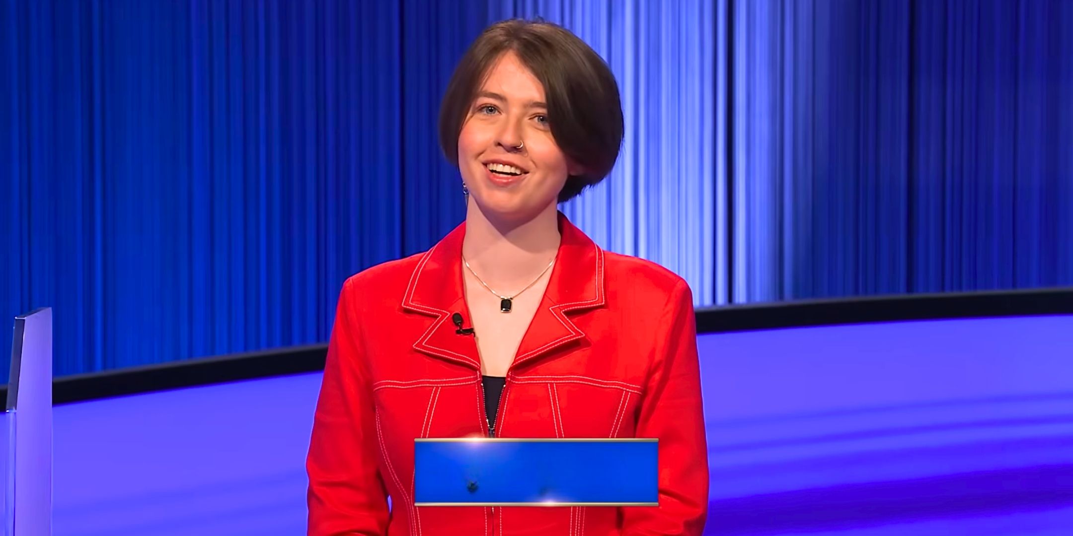 Jeopardy!’s Stella Trout smiles on stage