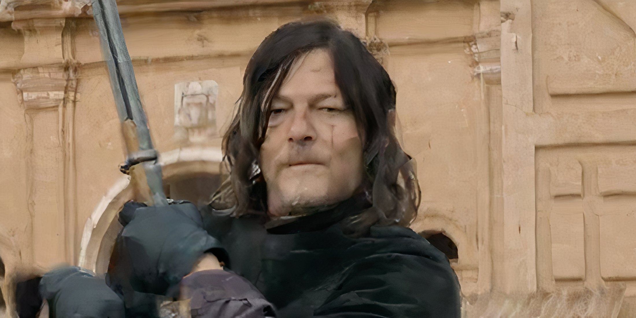 Norman Reedus as Daryl loading a shotgun in The Walking Dead Daryl Dixon season 3 trailer