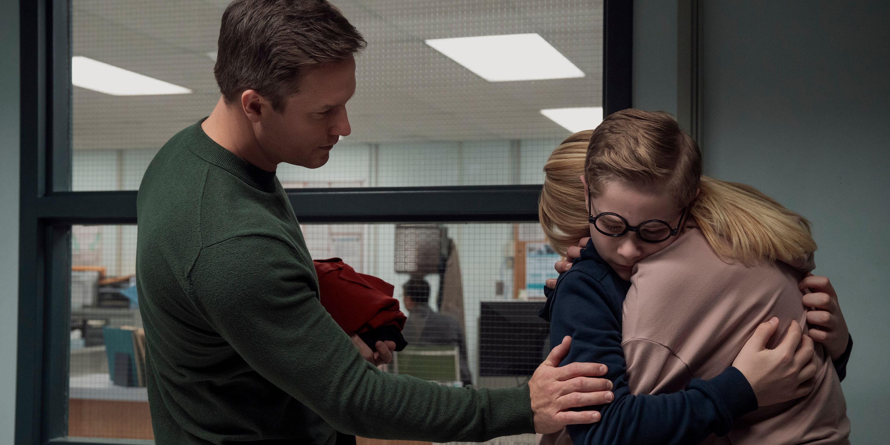 Paul holding Austin's arm while he hugs his mom in Ginny & Georgia season 3