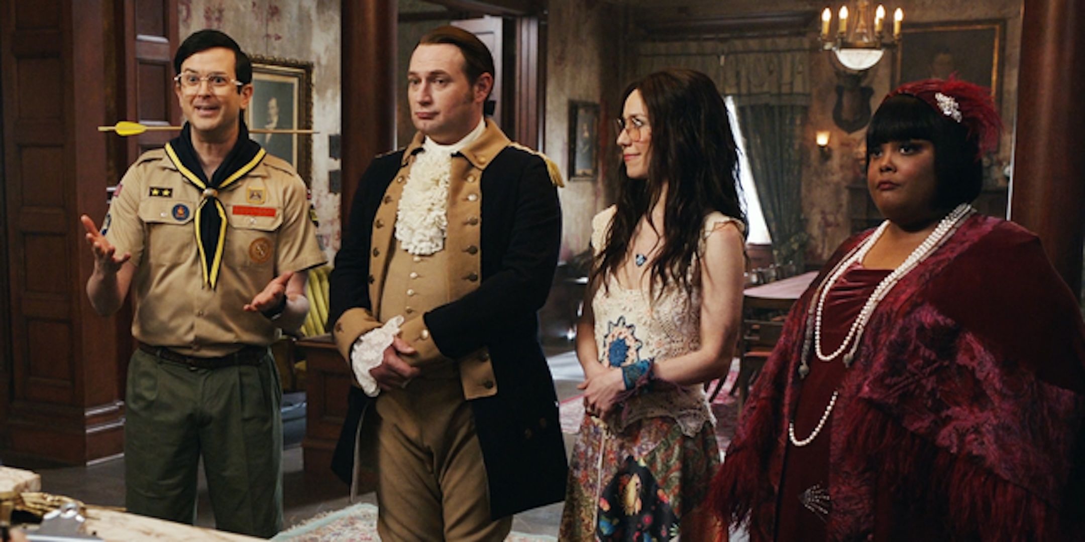 Pete Isaac Flower and Alberta stand in the front room together in Ghosts season 4