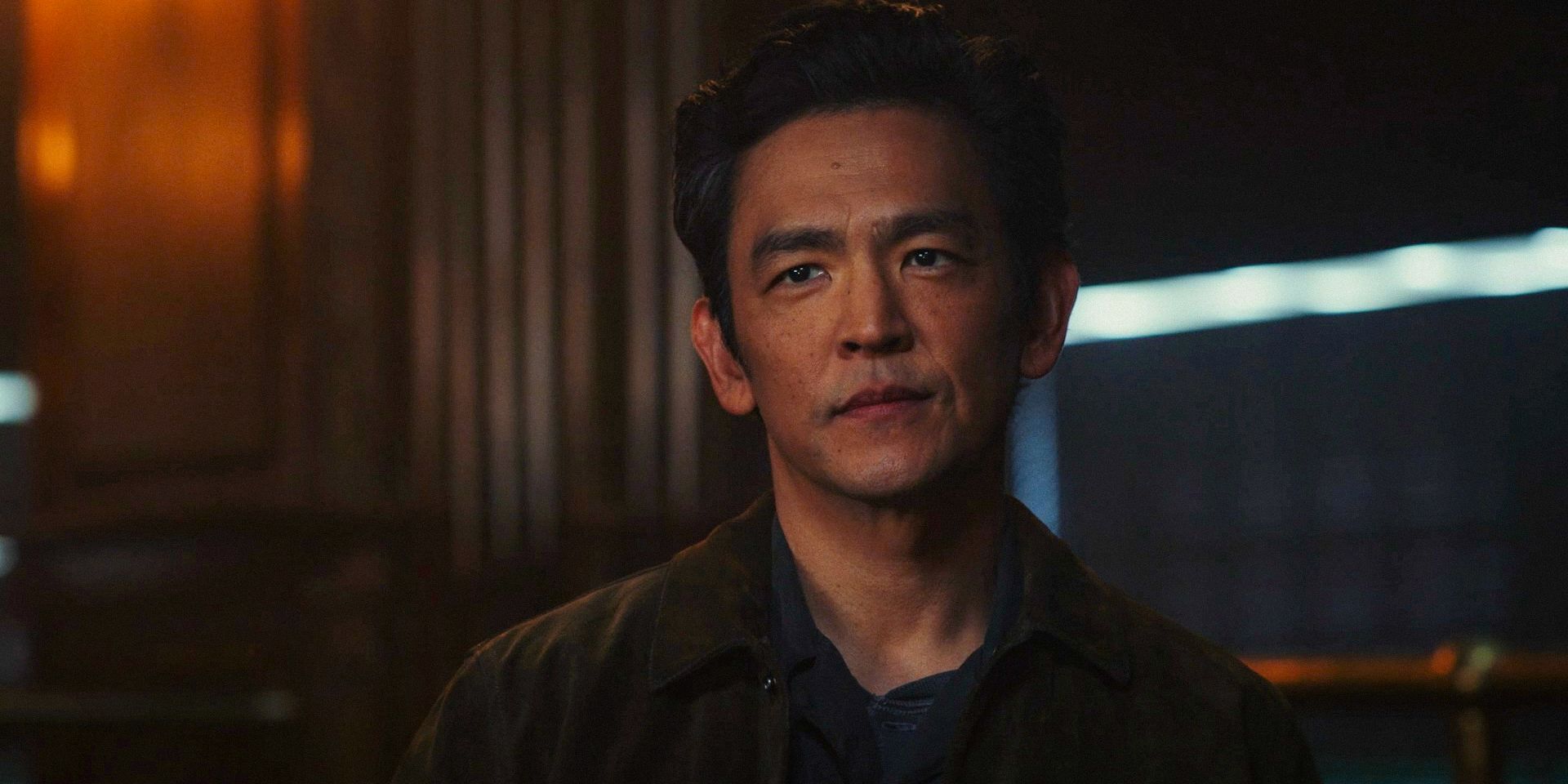 Guy (John Cho) listening attentively in Poker Face Season 2 Ep 8