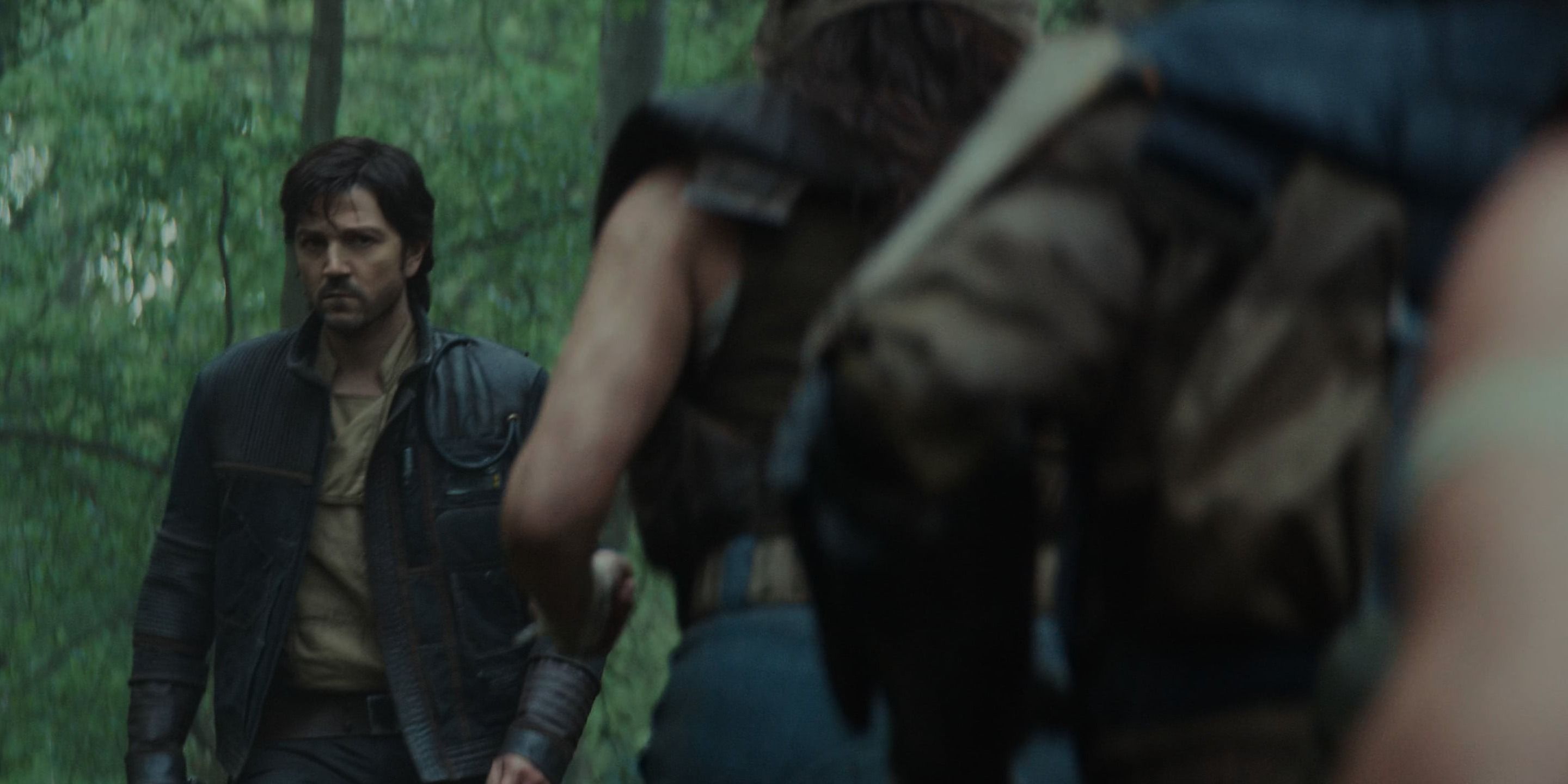 Cassian Andor walking in Andor season 2 near someone who could be Cara Dune