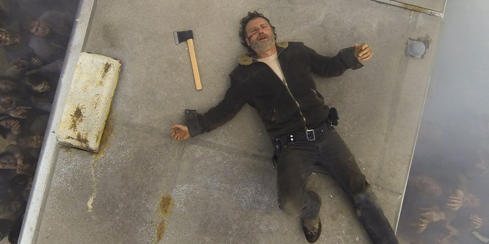 Rick on the roof of an RV in The Walking Dead