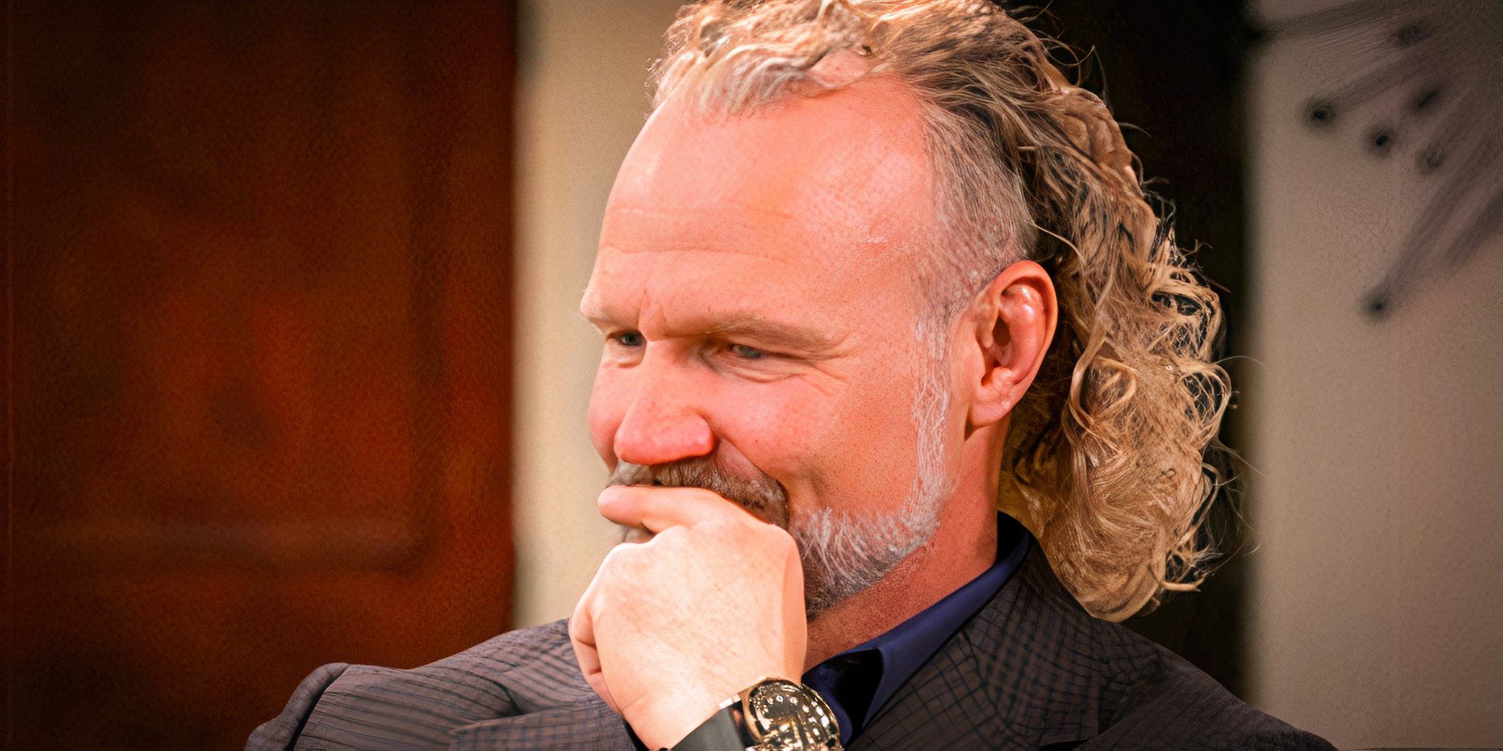 Sister Wives Kody Brown thinking with finger on lips