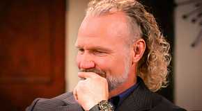 Sister Wives Kody Brown thinking with finger on lips