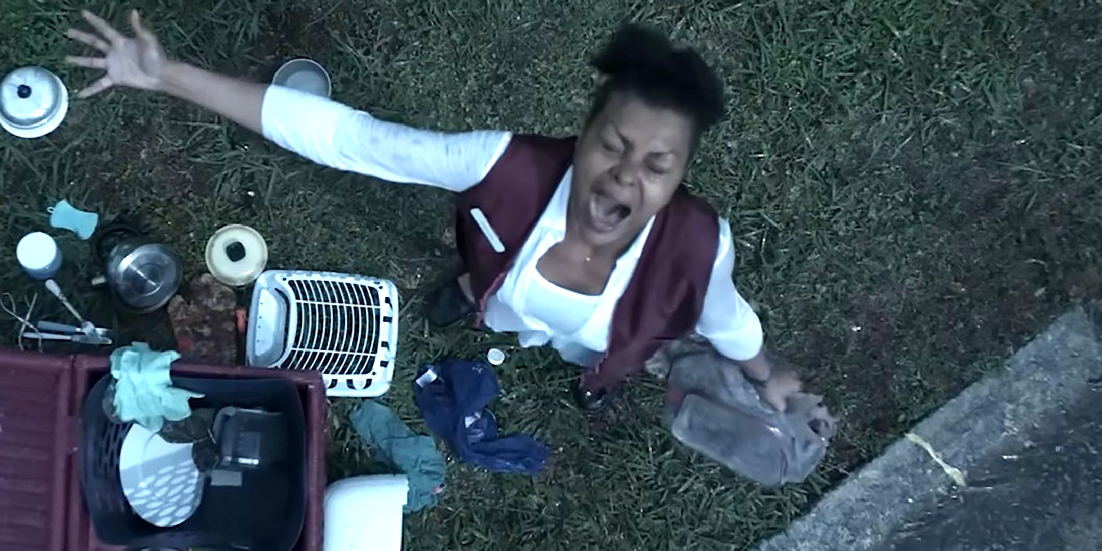 Taraji P. Henson as Janiyah screaming into the sky with her stuff on the ground in Straw