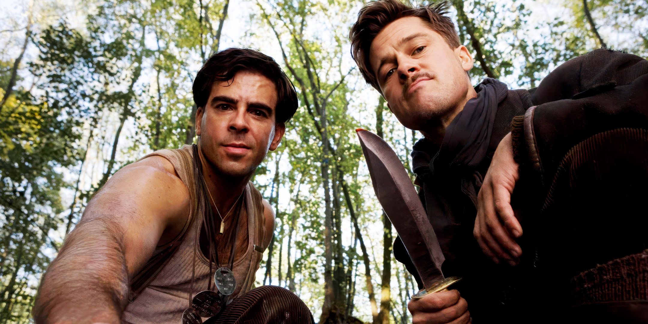 Brad Pitt holding a bowie knife and Eli Roth looking at the camera in Inglourious Basterds