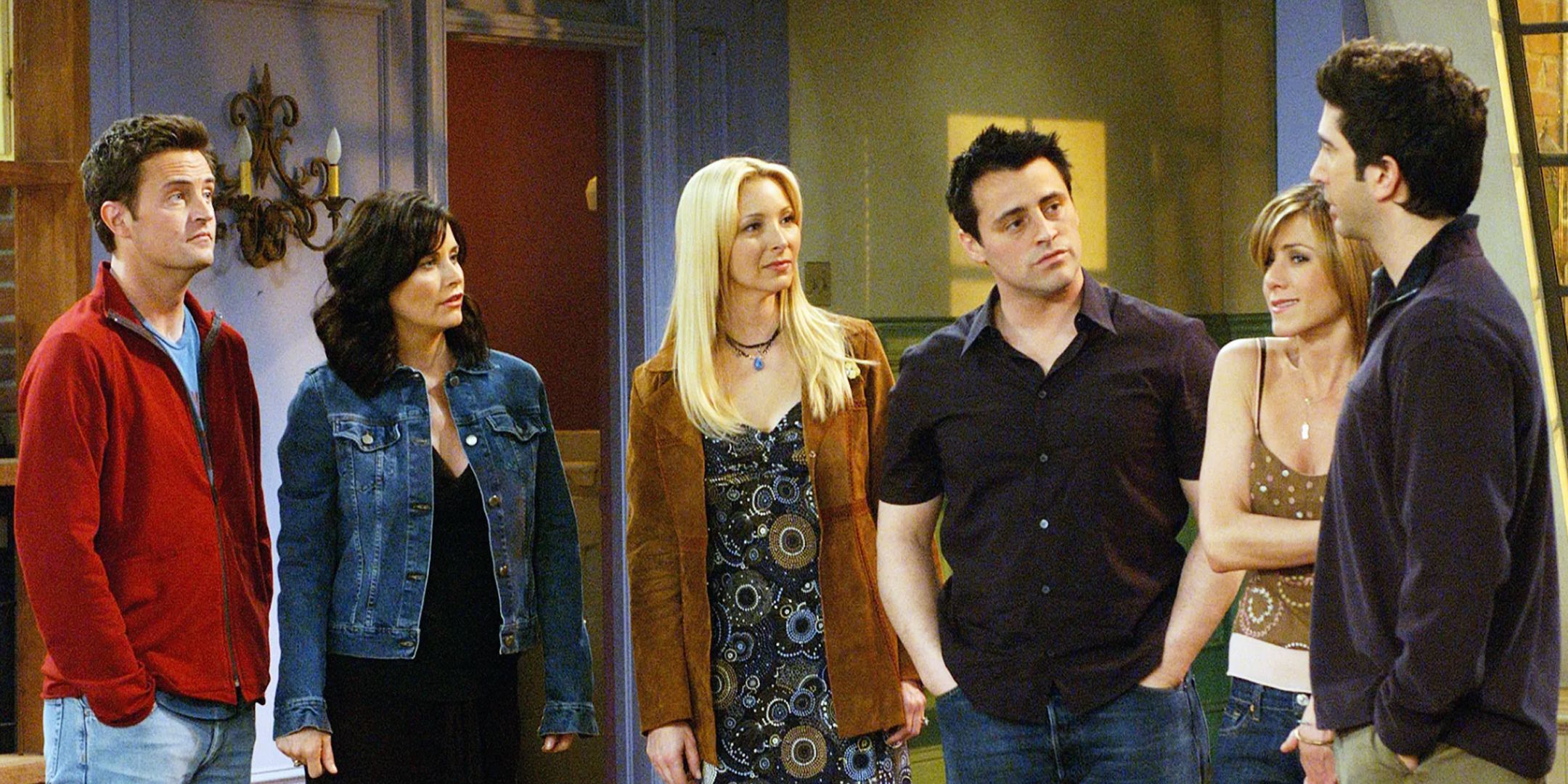 The cast of Friends in an empty apartment in the final episode