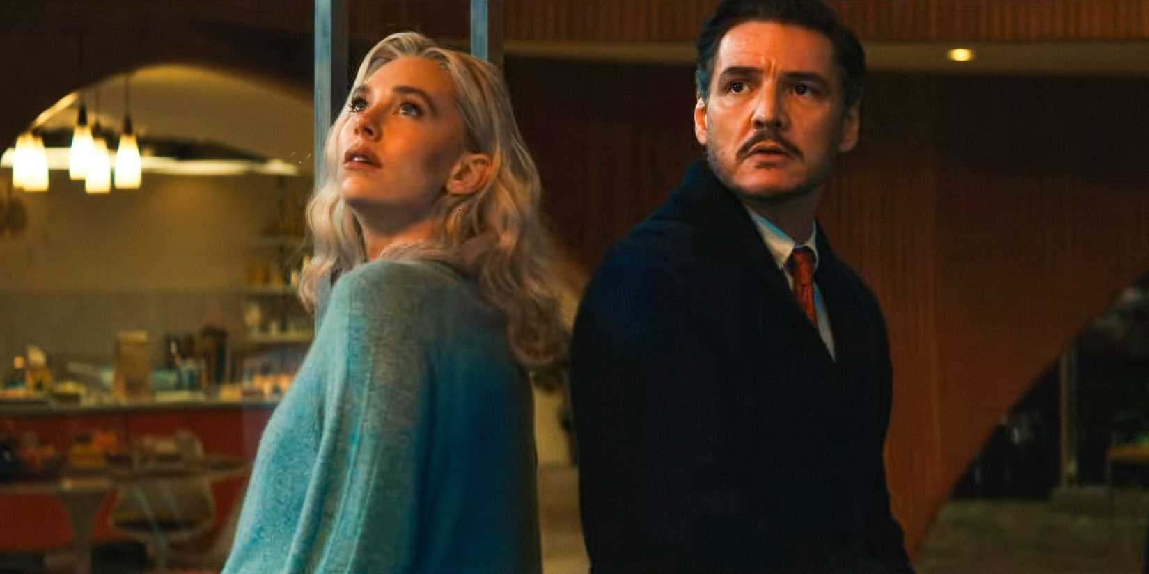 Sue Storm and Reed Richards stood back to back in The Fantastic Four First Steps