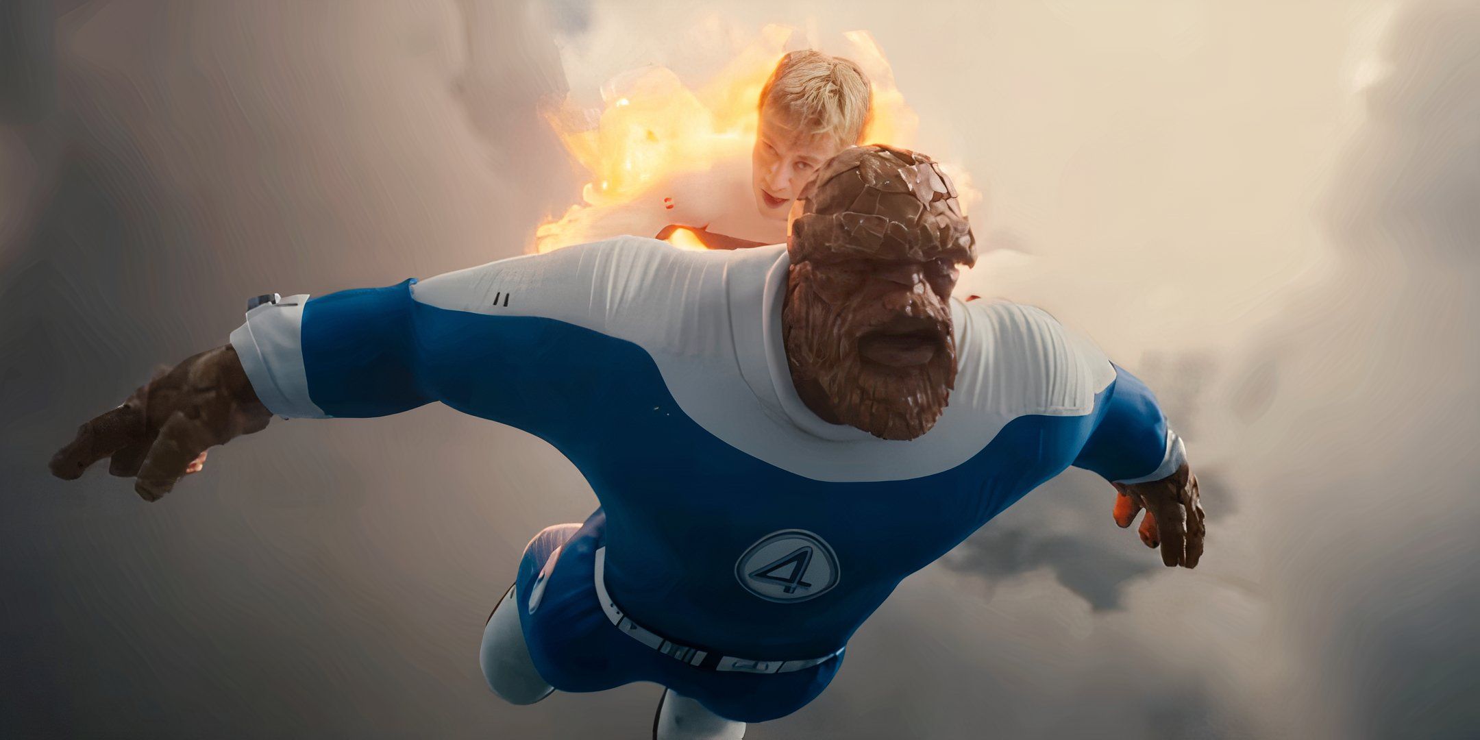 The Human Torch holding The Thing in the sky in The Fantastic Four: First Steps